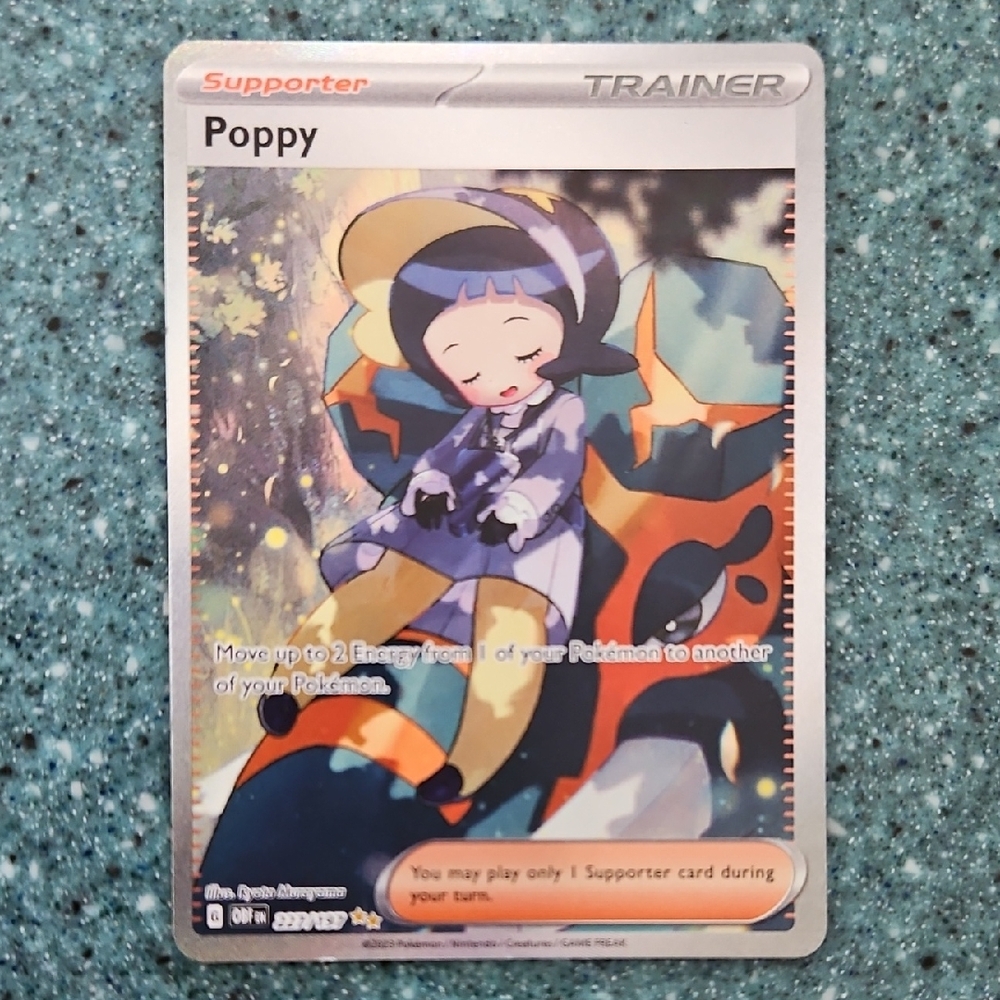 Pokemon Card - Poppy with Blue and Orange